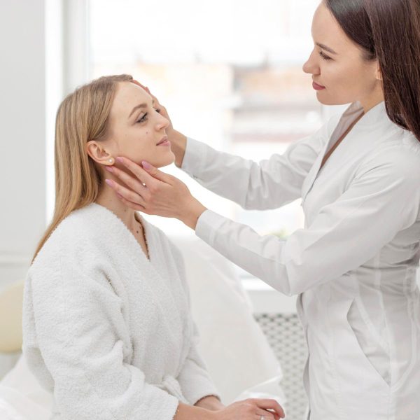 beautician-woman-clinic-consults-client